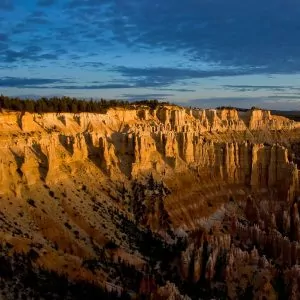Light from the sunset casts upon the rock spires of Bryce.