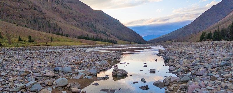 shallow water in mountains at sunset