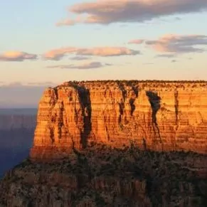 Grand Canyon in April sunset rock orange light clouds sky